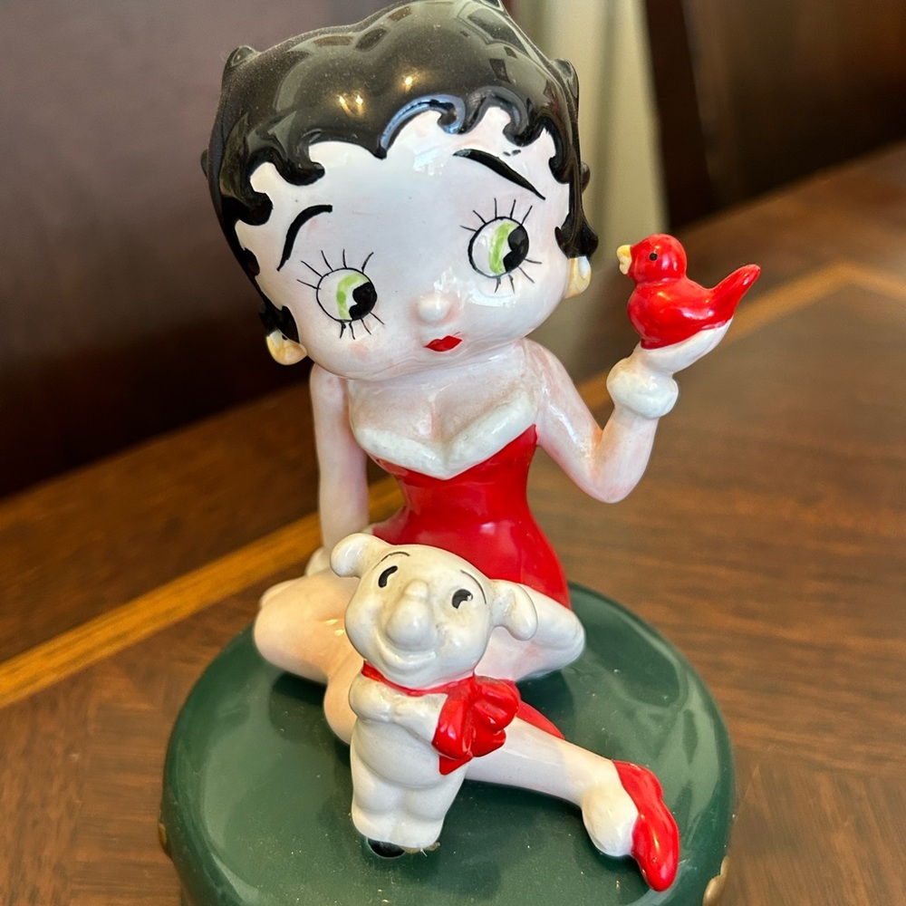 Betty Boop Figurine in Red Outfit with Black Hair and Green Base